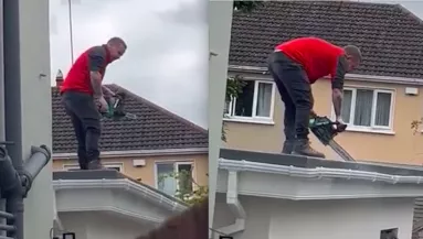 Nem fizetett a vállalkozó az építőipari munkásnak: láncfűrésszel ment a tetőre - Videó